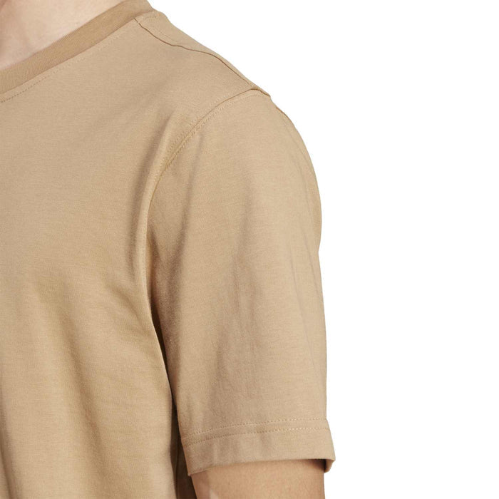 Men's tan T-shirt side sleeve with stitched seam and short sleeve cuff
