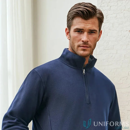 Man in navy Trinity Half Zip Jacket from Biz Collection Trinity with concealed pockets