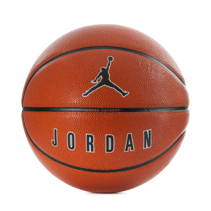 Orange basketball with black seams, Jumpman logo, and JORDAN lettering