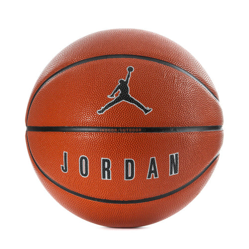 Orange basketball with black seams, Jumpman logo, and JORDAN lettering