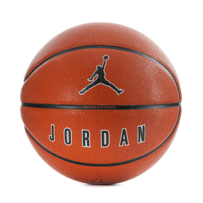 Orange basketball with black stitched panels and Jumpman logo at center