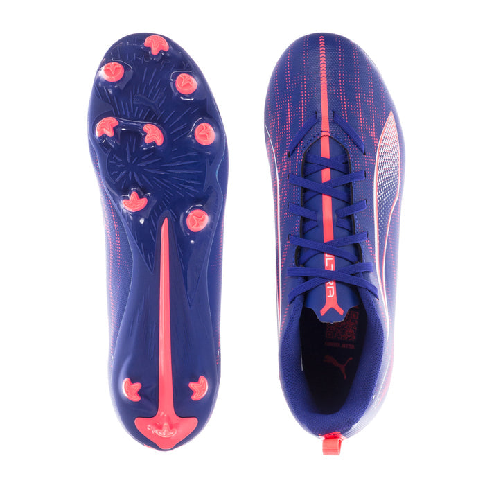 Youth soccer cleats pair showing outsole studs and heel, blue with coral detailing.