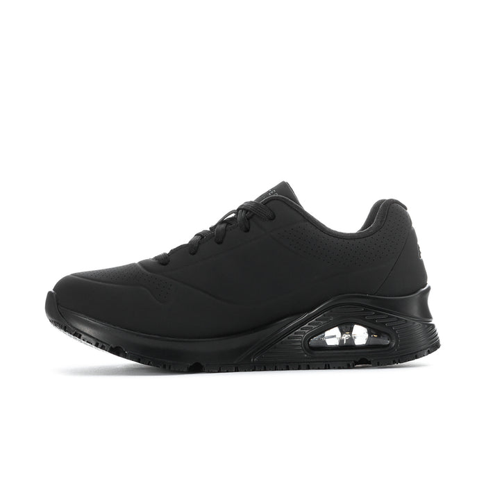 Women's black lace-up sneaker heel view with padded collar and brand logo