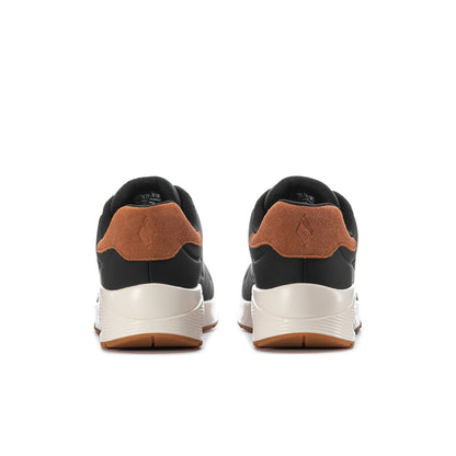Men's black sneakers with tan heel tab and white midsole