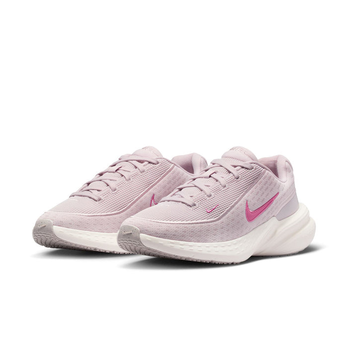 Women’s mauve lace-up sneakers with pink Nike Swoosh and cushioned white midsole