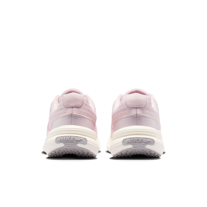 Women’s mauve running sneakers with padded heel and textured outsole at the back