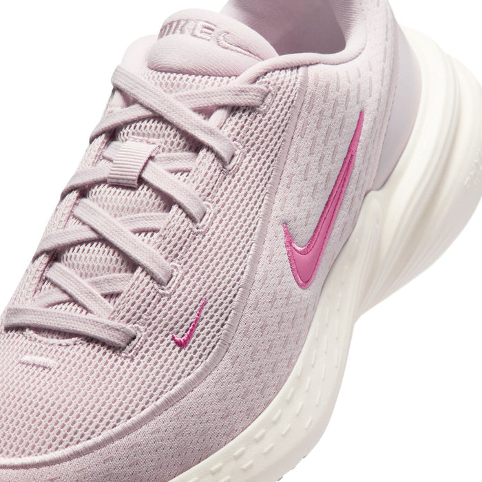 Close-up of women’s mauve knit upper sneakers with pink laces and Nike Swoosh