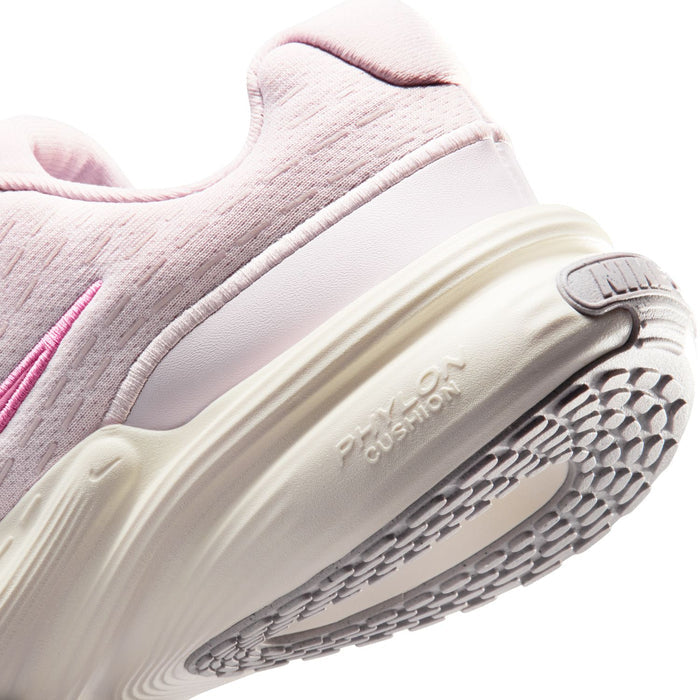 Side close-up of women’s mauve sneakers showing cushioned midsole and rubber outsole