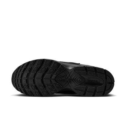 Men's black rubber outsole with deep tread pattern and sidewall branding