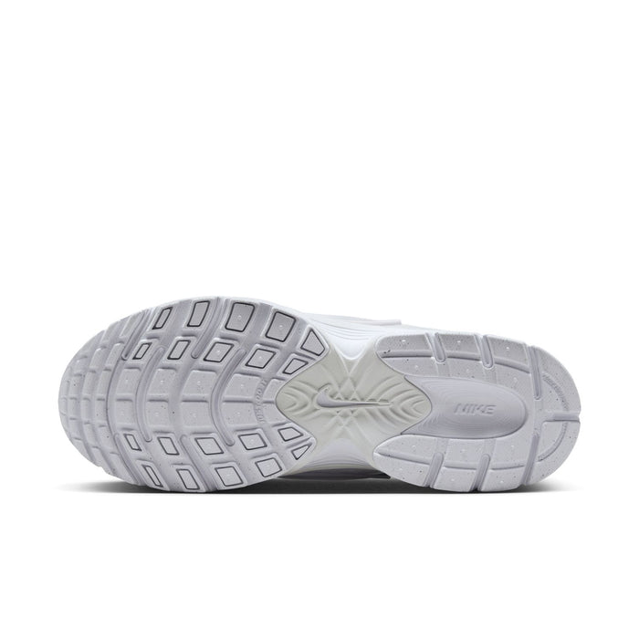 White sneaker outsole with grid tread pattern and molded brand logo