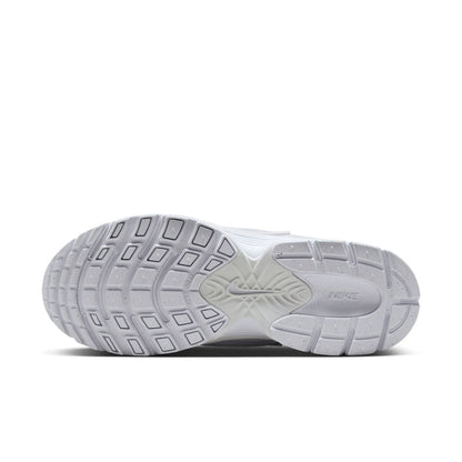 White sneaker outsole with grid tread pattern and molded brand logo