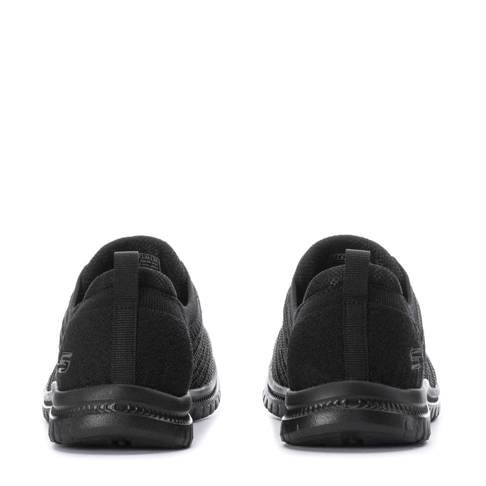 Black women's wide knit sneakers, back view showing heel cushioning, pull tab, and tread sole