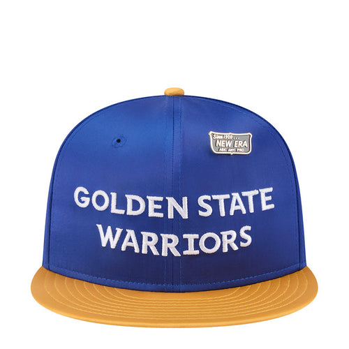 Blue satin baseball cap with yellow brim, white Golden State Warriors text