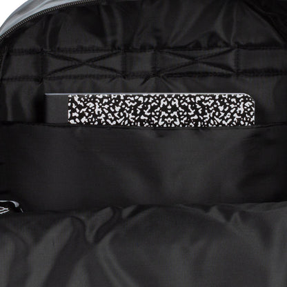 Black backpack interior pocket with leopard-print fabric panel