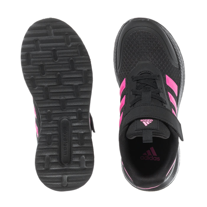 Kids black sneakers shown from sole and heel with pink stripe accents