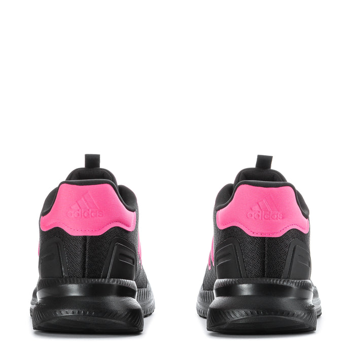 Youth black sneakers from the back with pink heel panels and black pull tabs