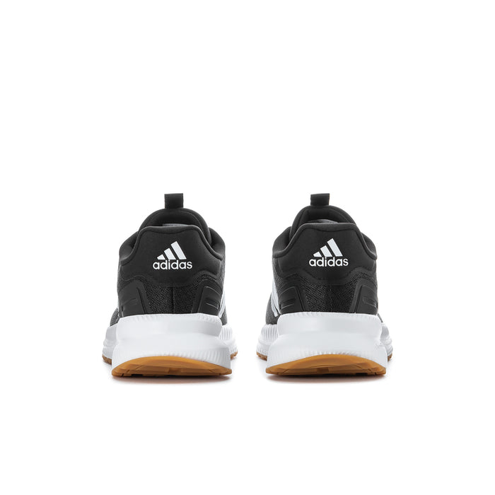 X_PLR Path Wide women's sneakers, heel view in black with white midsole and gum tread.