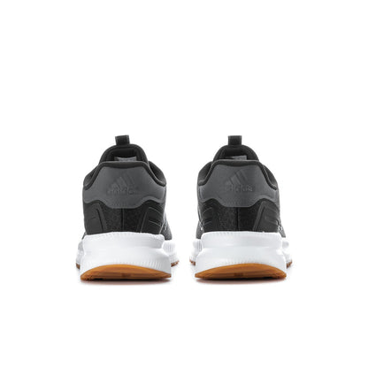 Men's wide running shoes, black back view with white midsole and gum outsole edge