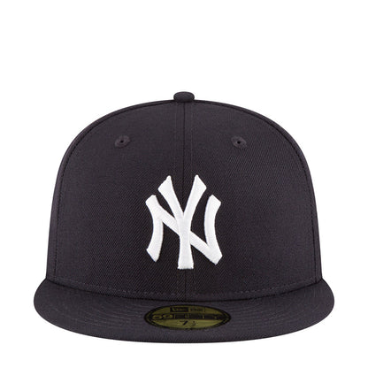 Dark baseball cap with white NY logo on front panel