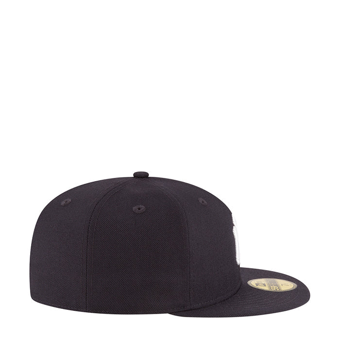 Dark baseball cap, side view with curved brim and top button