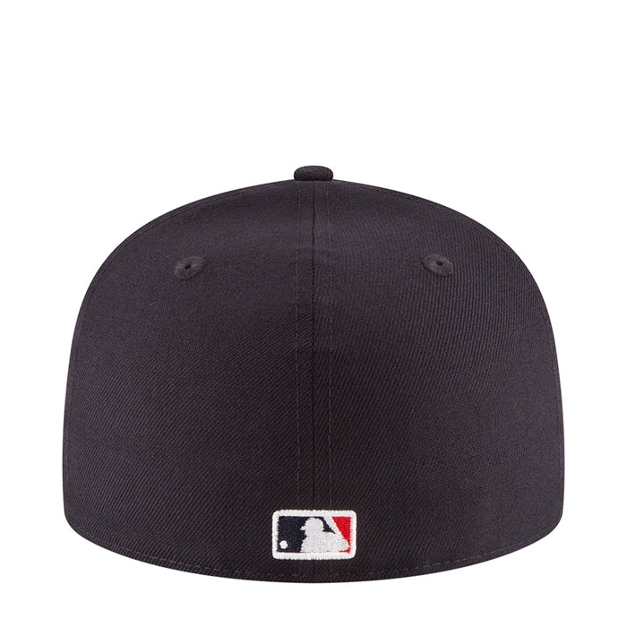 Dark baseball cap back view with MLB-style batterman logo patch