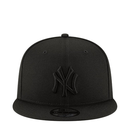 Black baseball cap with raised NY logo on the front and curved brim
