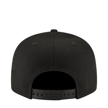 Black baseball cap back view with adjustable strap and six-hole detail
