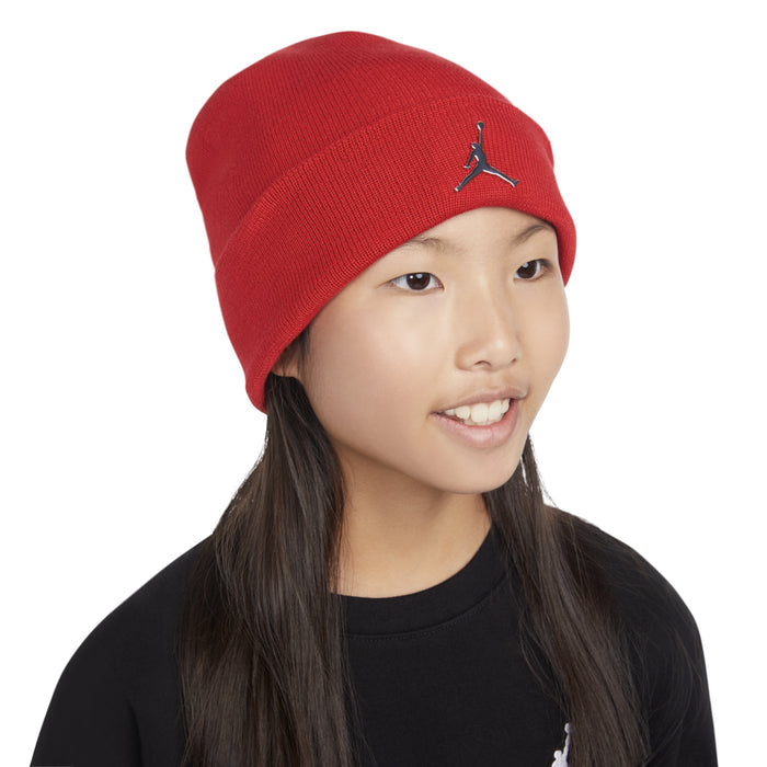 Youth red beanie with Jumpman logo, worn by child