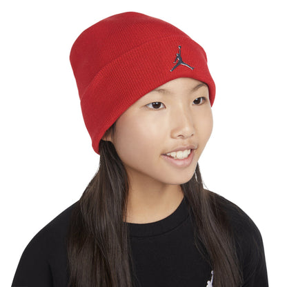 Youth red beanie with Jumpman logo, worn by child