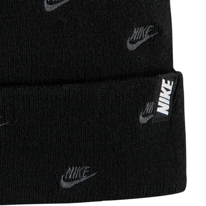 Black beanie cuff with woven Nike patch label and repeating Nike logos