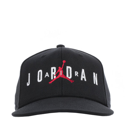 Youth black snapback cap with embroidered Jordan logo and red accents