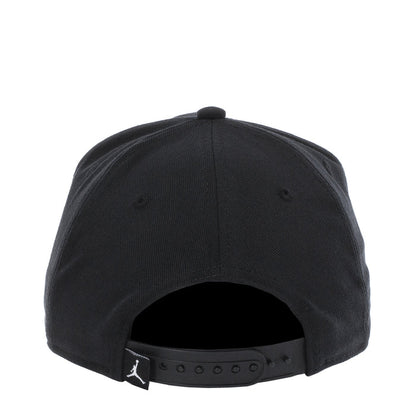 Youth black snapback cap with adjustable rear strap and embroidered Jordan mark