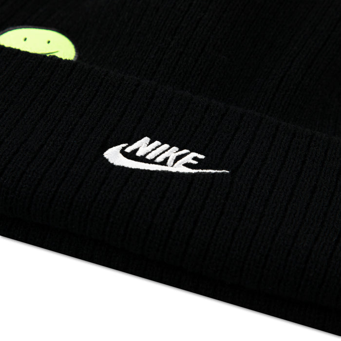 Black knit youth beanie with white Nike logo patch on cuff