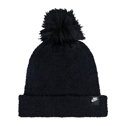 Black plush pom beanie with Nike logo patch on cuff