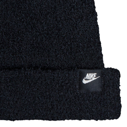 Black plush beanie cuff with Nike logo patch, textured knit